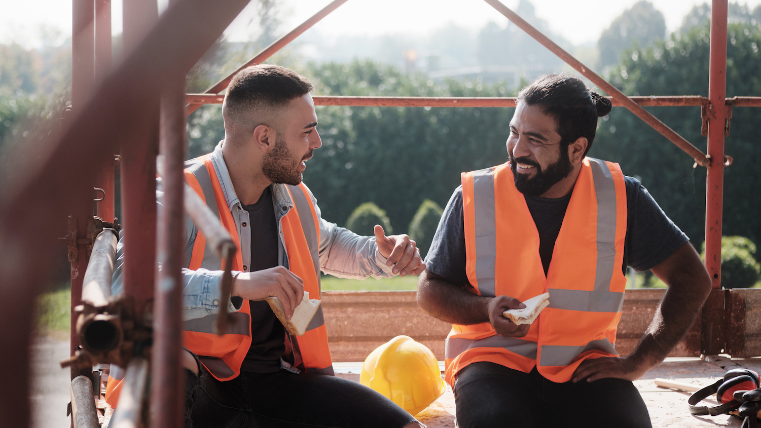 Construction project workers having a lunch break