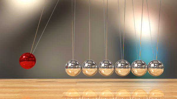 Image of a Newton's cradle, illustrating Transforming Construction
