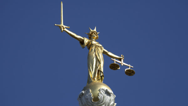 The statue of justice above the Old Bailey: image to illustrate information management and disputes