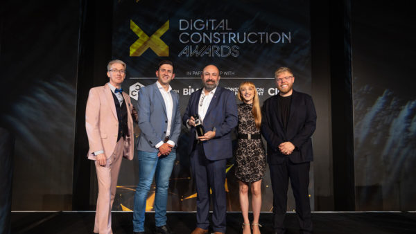 Rob Jackson and Emma Hooper, then of Bond Bryan Digital, collecting the trophy at the Digital Construction Awards 2023