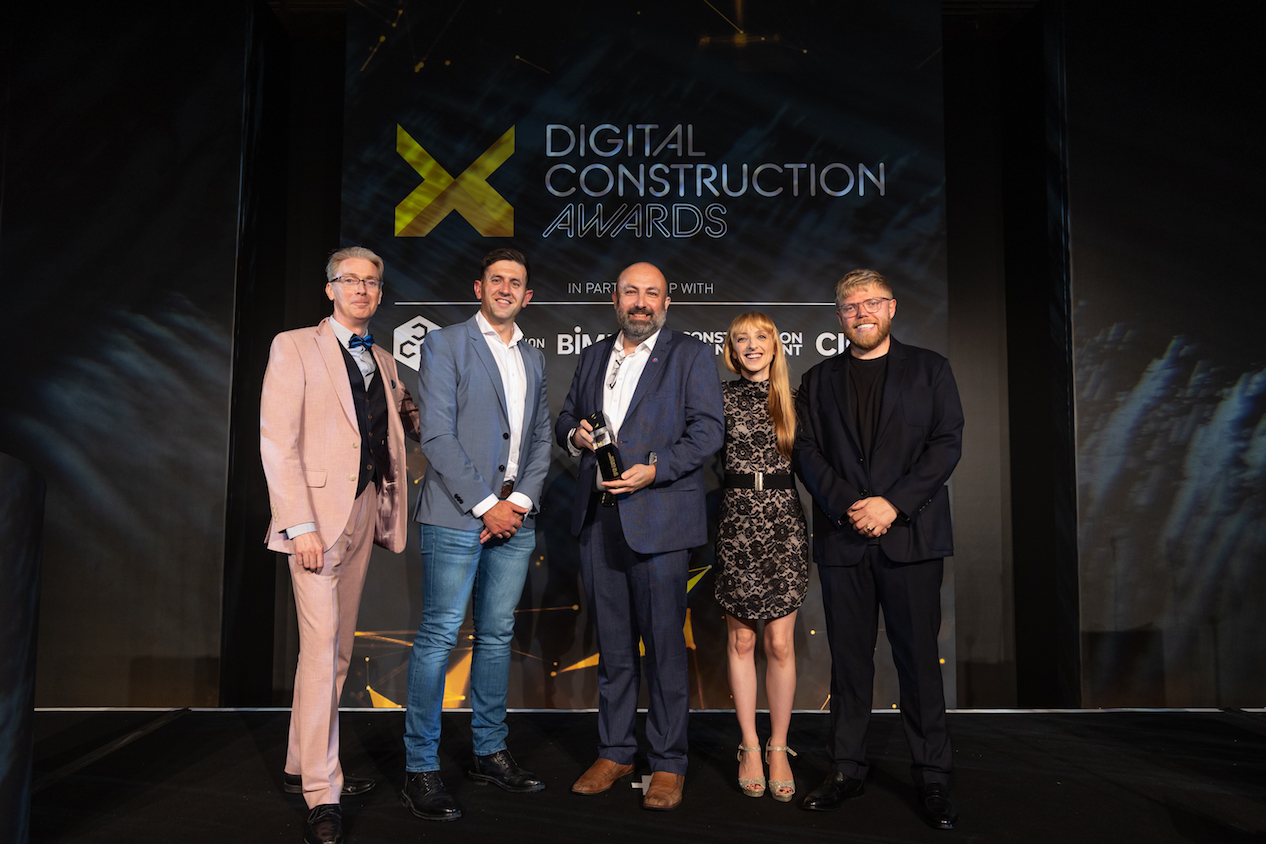 Rob Jackson and Emma Hooper, then of Bond Bryan Digital, collecting the trophy at the Digital Construction Awards 2023