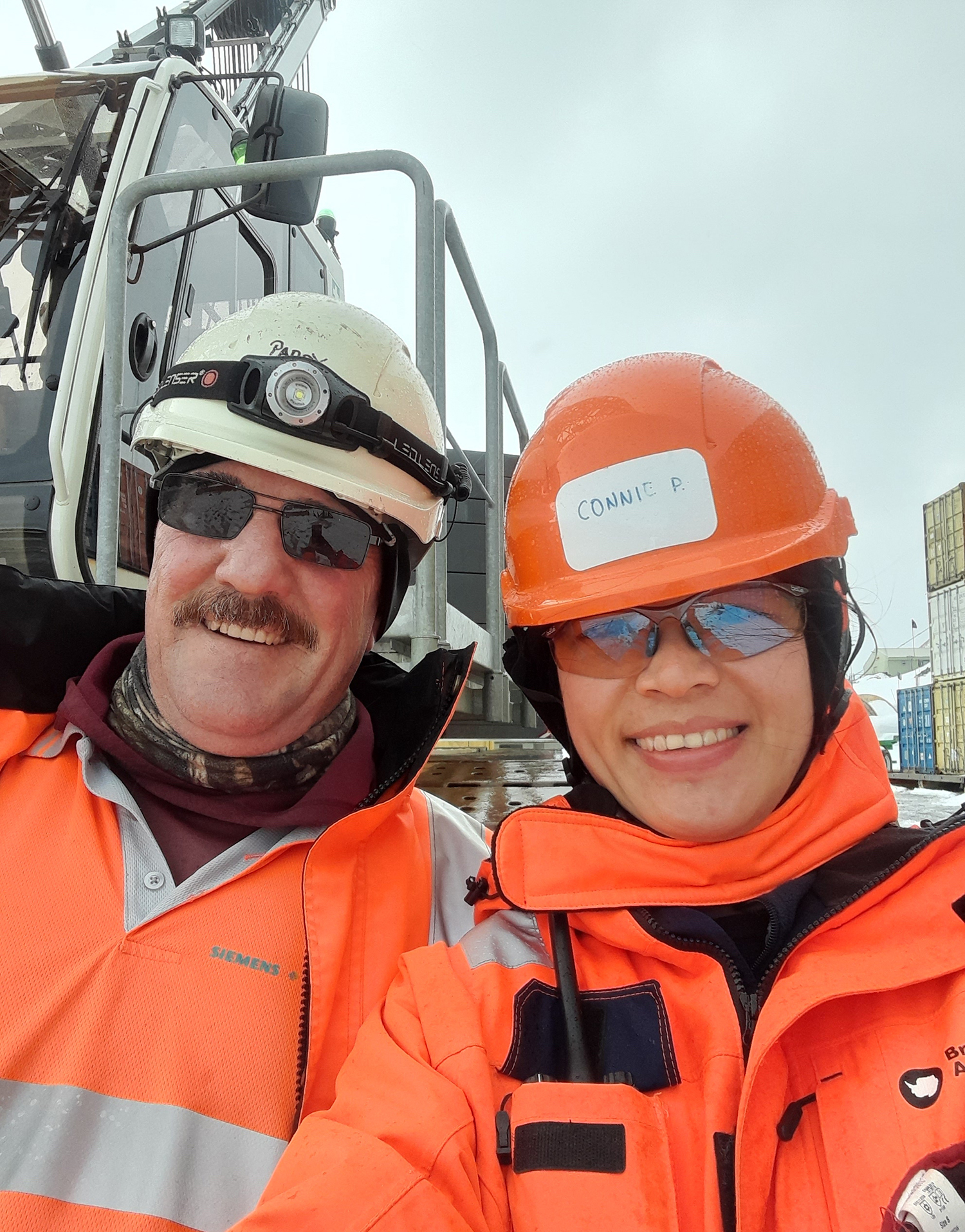 Ramboll engineer Connie Pang, right, with veteran Antarctic builder Paddy Clarke, crane operator with BAM (photo: Connie Pang)