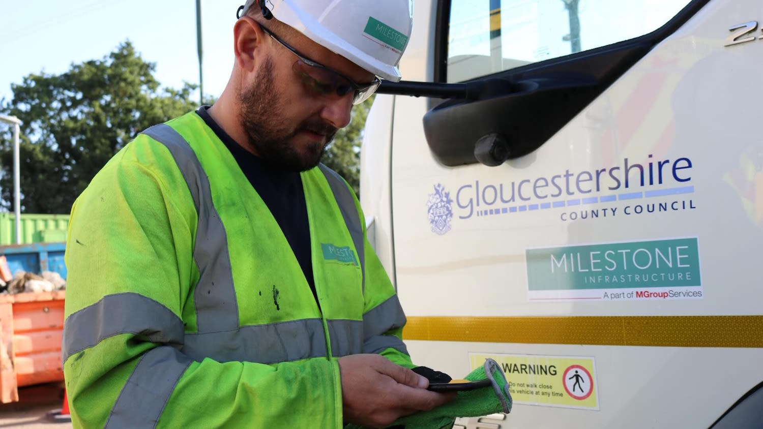 Photo of Milestone Infrastructure Services personnel using technology to illustrate Steven Frost interview