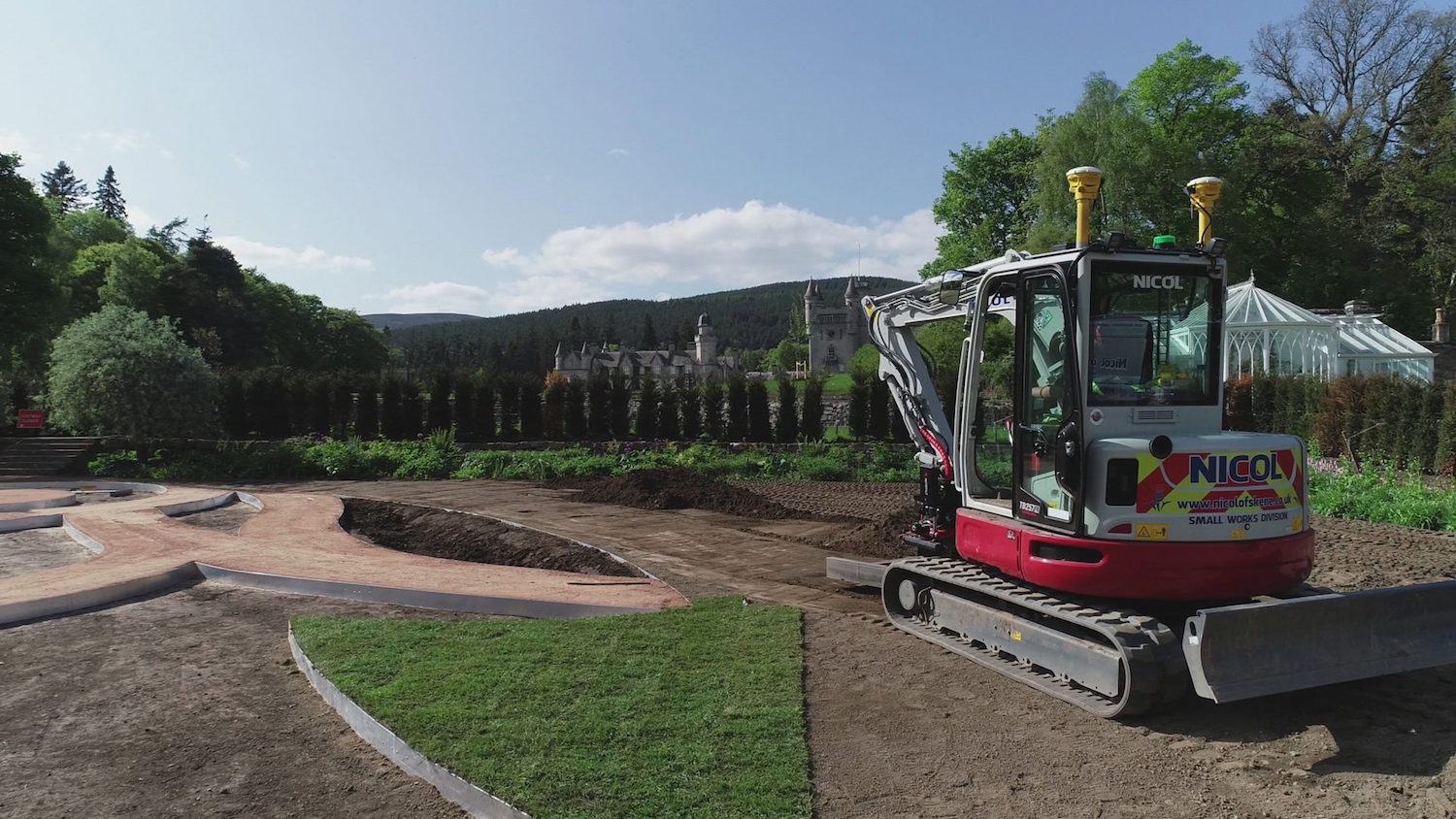 A machine controlled excavator working on the Balmoral maze